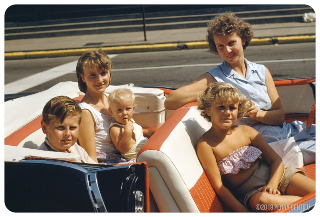 family in car with julia